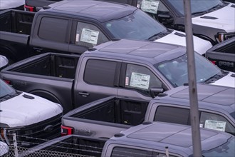 Ford FX4 pickup trucks on stockpile, in the overseas harbour of Bremerhaven, after import from the