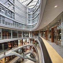 Stilwerk Düsseldorf, interior photo, elliptical atrium with surrounding galleries on five sales