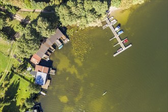 Aerial view of boat sheds at lake Schwarzer See, Mecklenburg lake district, Mecklenburg-Vorpommern,