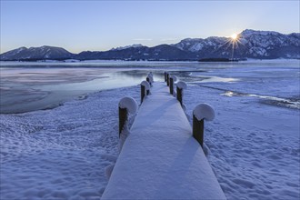 Sunrise at a lake in front of mountains, footbridge, snow, winter, Forggensee, Königswinkel, view