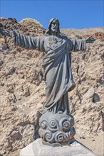 Statue of Christ Statue of Jesus Christ on plateau of Mount Teide Teideplateau next to valley