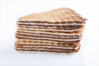 Waffle sandwiches with boiled condensed milk isolated on white background. closeup