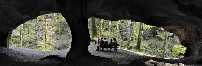 The Hohllay cave showing grooves and circles in the sandstone rock from carving millstones,