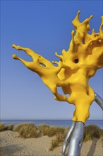 Sculpture Olnetop by Belgian artist Nick Ervinck in the dunes at seaside resort Westende,