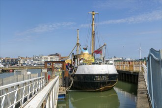 Historic fishing boat trawler museum Mincarlo in harbour at Heritage Quay, Lowestoft, Suffolk,