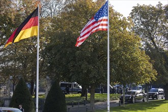 Joe Biden (46th President of the United States) drives past the flags of Germany, the USA and the