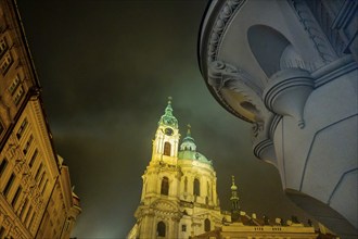 St. Nicholas Church with facades, night, tourism, city trip, at night, central square, Prague,