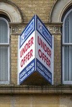 Under Offer sign commercial property Hazells estate agents, Stowmarket, Suffolk, England, UK