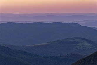 Dawn over the mountain landscape of the Balkan Mountains and the wooded slopes of the Balgarka