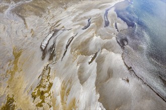 Sandbank in the river Rio Ibanez short before flowing into lake Lago General Carrera, structures