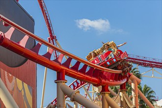 Park guests riding the Hollywood Rip Ride Rockit roller coaster at Universal Studios in Orlando,