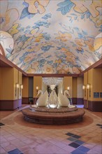 Interior water fountain with swans at the Swan Resort Hotel in Walt Disney World, Orlando, Florida,