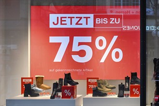 Shop window shoe shop 75% discount