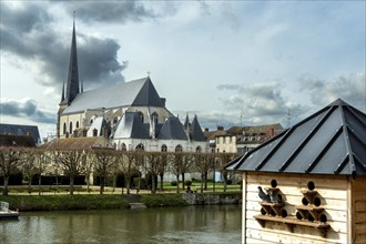 Nemours. Saint-Jean-Baptiste church on river Loing. Seine-et Marne department. Ile-de-France.