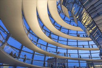 Visitors in the spiral-shaped Reichstag dome, Berlin, 21 May 2014