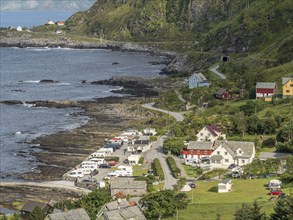 Camper vans on Goksoyr camping site, at the outer coast of island Runde, Runde island, Norway,