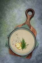 Mushroom cream soup, with dill and bruschetta, mushroom eringi