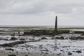 Graves near the settlement of Togoru flooded by rising sea levels, 07.05.2024. Bärbock is