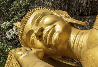 Reclining Buddha statue, Phousi or Phu Si Hill, Luang Prabang, Laos, Asia