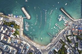 Aerial view of an idyllic harbor landscape with sailboats and yachts, AI generated