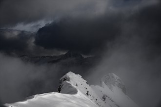 Summit ridge with light and shade in winter, Baad, Vorarlberg, Austria, Europe