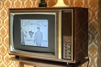 Vintage seventies Philips Multistandard television TV X26K221 showing black and white 70s broadcast