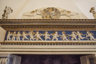 Mantelpiece with angel figures in Palazzo Ducale, Unesco world heritage site Urbino, Urbino and