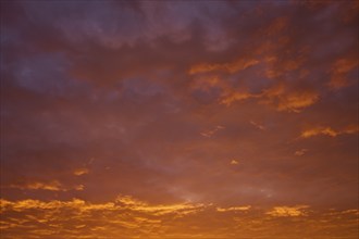 Dramatic sky with orange-red clouds at sunrise, Großheubach, Miltenberg, Main, Spessart, Bavaria,