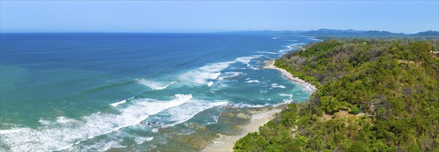 Aerial view, rainforest, sandy beach and coast with waves, Playa Cocalito, Puntarenas, Costa Rica,