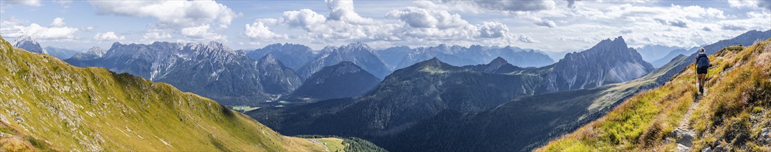 Alpine panorama, hiker on the Carnic High Trail, Carnic main ridge, Carnic Alps, Carinthia,