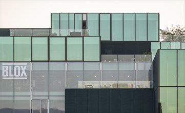 Modern glass façade, minimalist design, Blox multifunctional building, architect OMA Rotterdam,