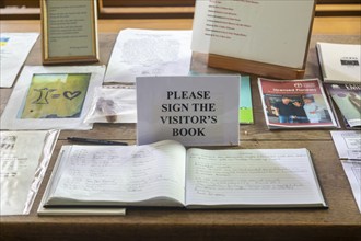 Please sign the Visitor's Book, church of Saint Andrew, Alderton, Suffolk, England, UK