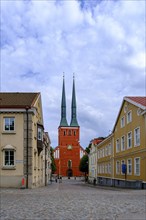 City centre scene with view of the tower facade of Växjö Cathedral, Smaland, Kronobergs län,