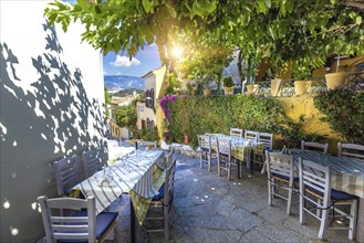 Greece, historic neighborhood of Plaka and Anafiotika in Athens with restaurants near Acropolis,