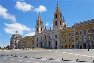 Large square in front of a baroque palace with magnificent architecture under a clear sky, National