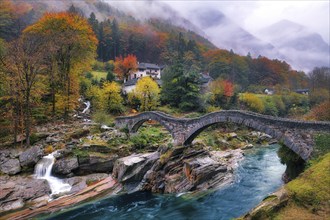 Stone bridge Ponte dei Salti near Lavertezzo on a rainy autumn day, Verzasca Valley, Canton Ticino,