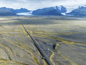 Aerial view of the Skeidara Bridge Monument viewpoint, large metal parts of the bridge that was