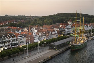 Bark Alexander von Humboldt II and the old town centre of the Baltic Sea resort of Travemünde, Bay