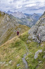 Hiker on the Carnic High Trail, Carnic Main Ridge, Carnic Alps, Carinthia, Austria, Europe