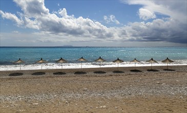 Line of sunshades along the beach Ionian Sea, Dhermi, Albania, Europe