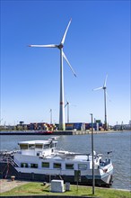 The port of Antwerp, on the Scheldt, is the second largest seaport in Europe, Wind turbines in the