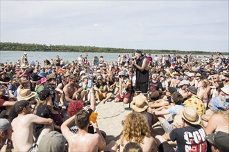 Matthias Engst, singer of the band Engst on the beach in front of the Becks Beach Stage at the