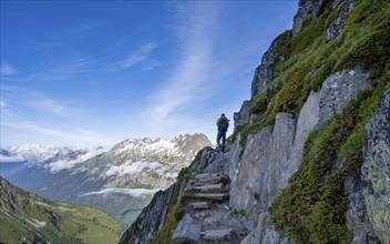 Mountaineer on a hiking trail, view of mountain panorama, Chamonix, Haute-Savoie, France, Europe