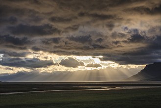 Cloudy mood, sunbeams, fjord, mountains, coast, Westfjords, Iceland, Europe