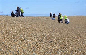 Border Force staff conduct training exercise on beach at Shingle Street, Suffolk, England, UK