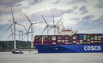 Entrance to the seaport of Rotterdam, Cosco Shopping Universe container freighter, entering