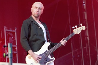 Adenau, Germany, 7 June 2024: Michael Shuman from Queens of the Stone Age plays at Rock am Ring.