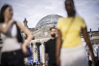 Scenes in the fan zone on Platz der Republik in front of the Reichstag building taken in Berlin, 29