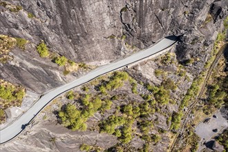 Aerial view of road FV44 above the Jossingfjord, historical road in valley, norwegian south coast,