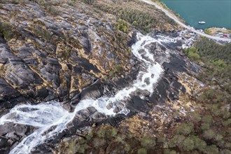 Aerial view over waterfall Langfoss at the Akrafjord, parking area for tourists, Norway, Europe